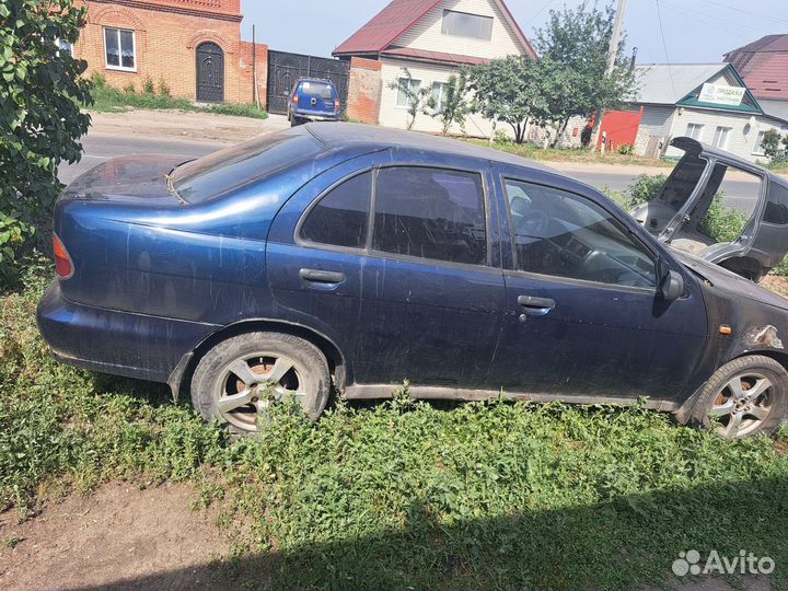 Дверь Nissan almera n15