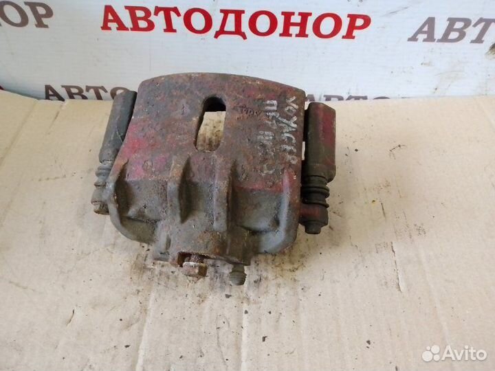 Суппорт тормозной передний правый Dodge Voyager