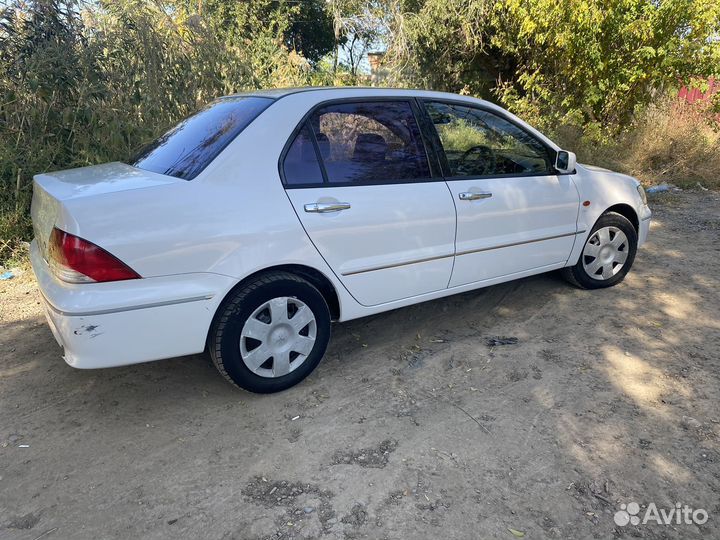 Mitsubishi Lancer Cedia 1.5 CVT, 2001, 100 000 км
