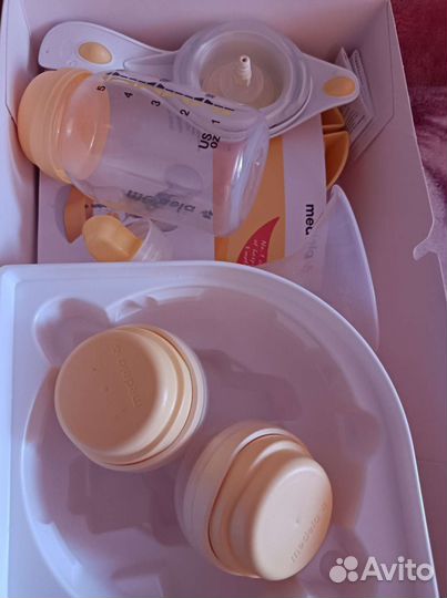 Молокоотсос medela ручной