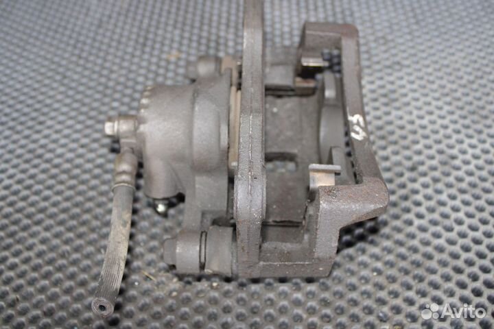 Суппорт тормозной задний левый Kia Sorento BL D4CB