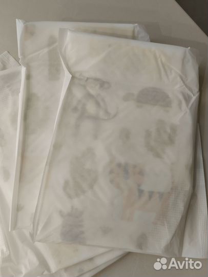 Нагрудники одноразовые