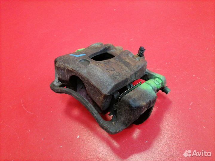 Суппорт передний левый Hyundai Solaris RB G4FA