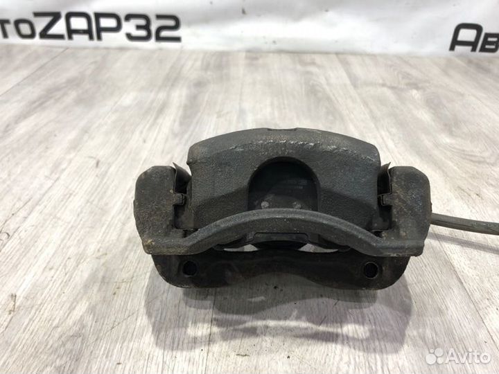 Суппорт тормозной передний левый Kia Rio 3 G4FA