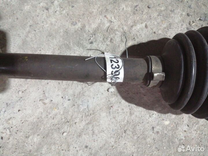 Полуось передняя левая (приводной вал, шрус) Mazda