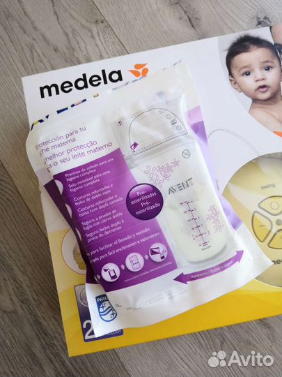 Молокоотсос Medela Swing электрический