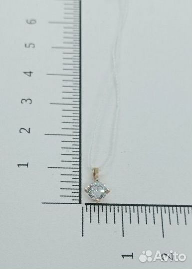 Золотая подвеска с камнем