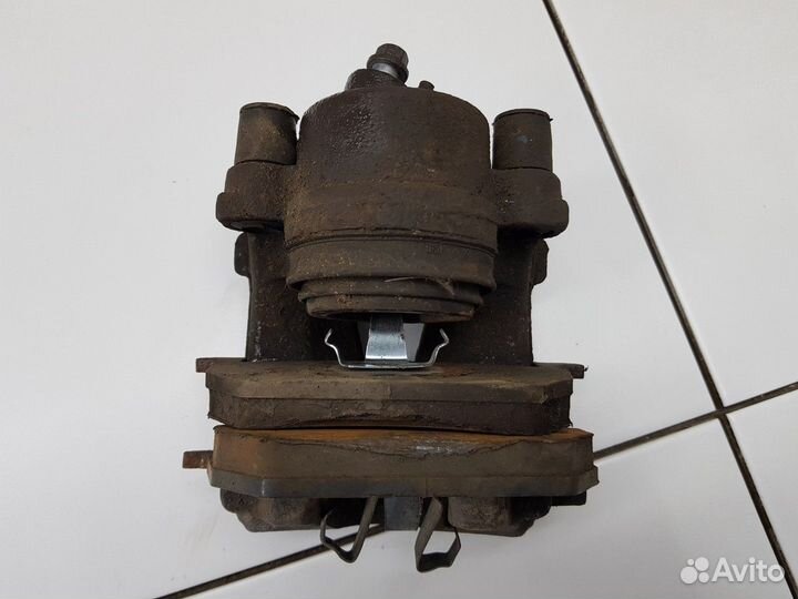 Суппорт передний левый (Skoda Octavia)