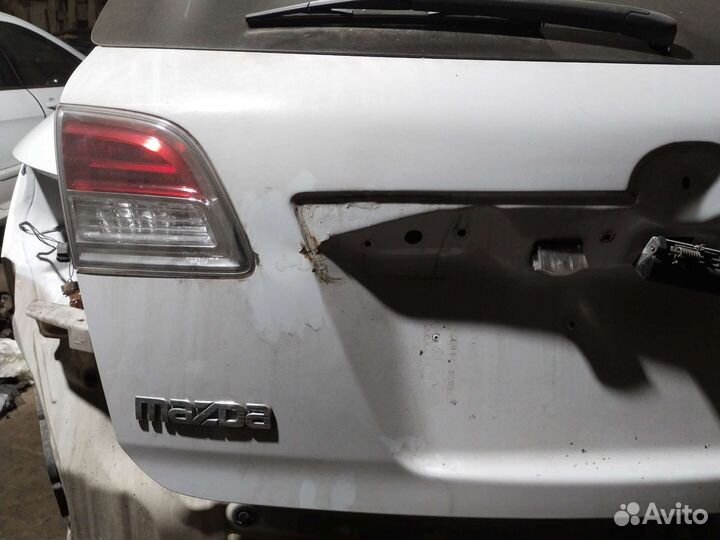 Фонарь задний л/п в крышку багажника Mazda CX-9 TB