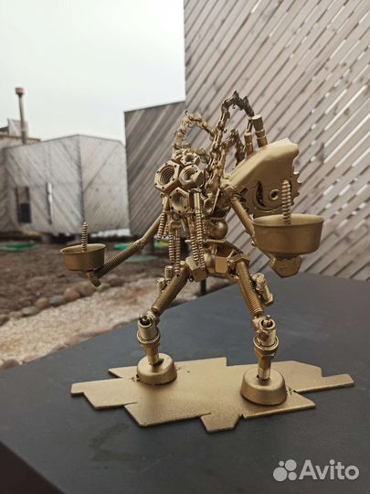 Металлическая скульптура. Подсвечник