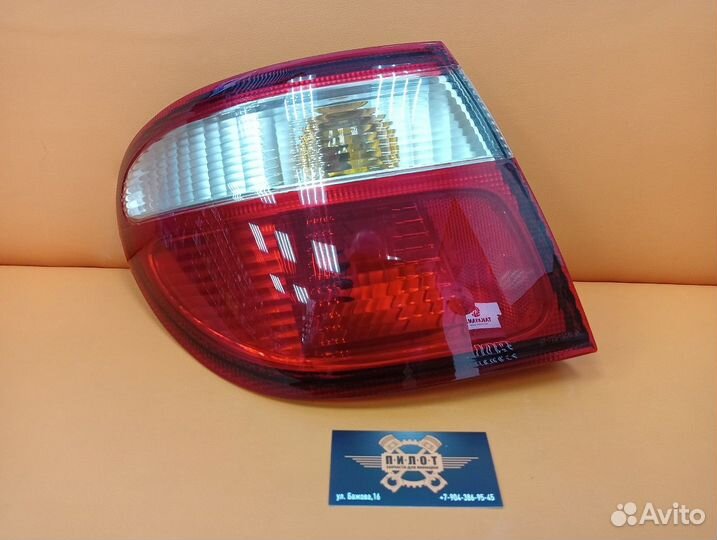 Фонарь задний наружный лев 215-19F4L6U almera N16