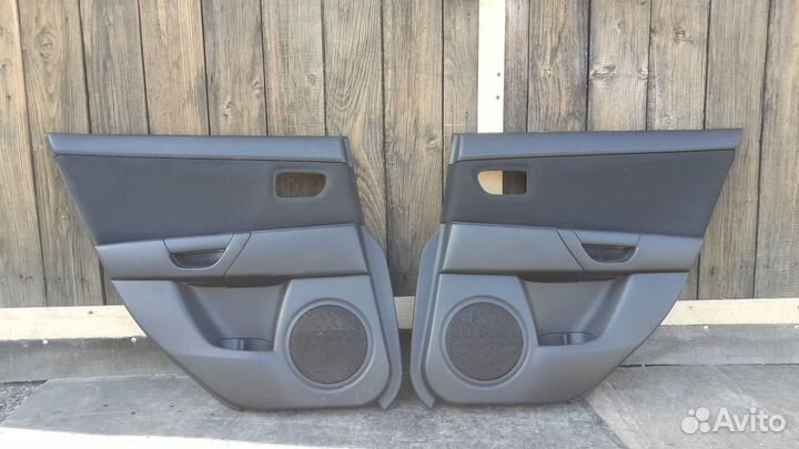 Мазда 3 2005 обшивка двери