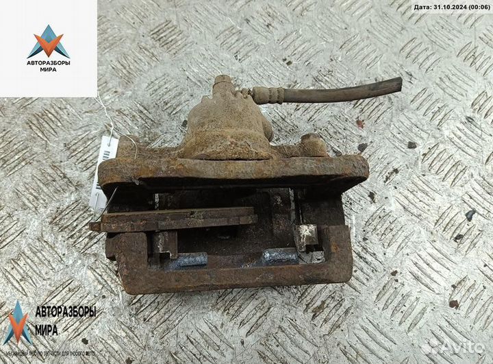 Суппорт задний правый Kia Sorento 2004