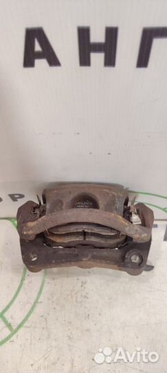 Суппорт передний левый Nissan Juke F15E HR16DE