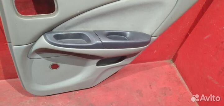 Обшивка задней правой двери Nissan Almera N16