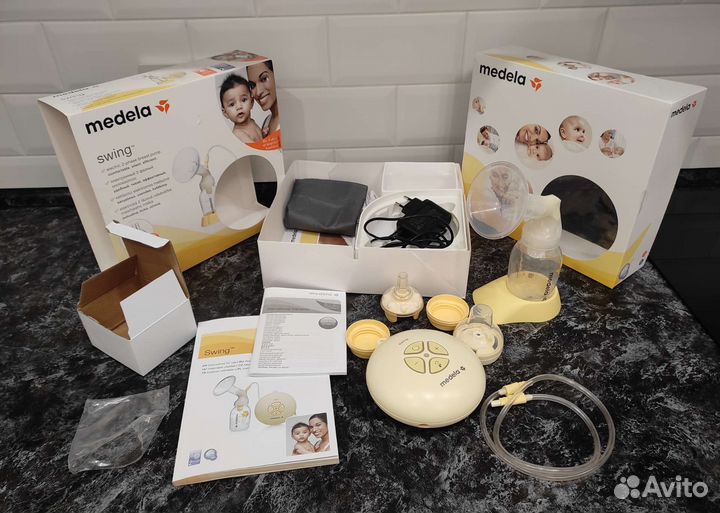 Молокоотсос medela swing электрический