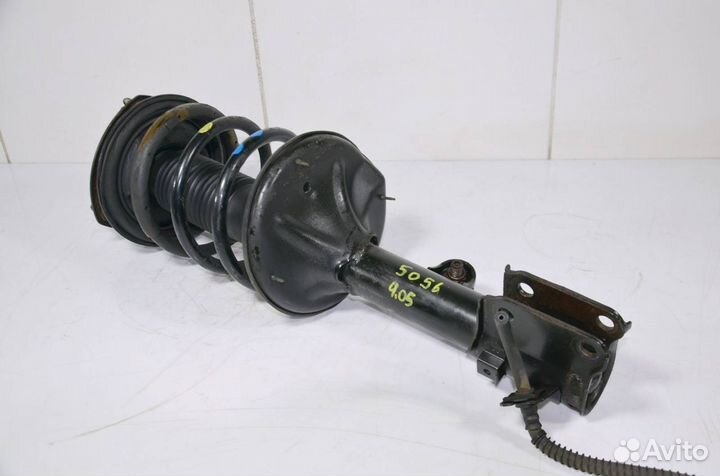 Стойка амортизатора передняя левая Kia Sportage 2