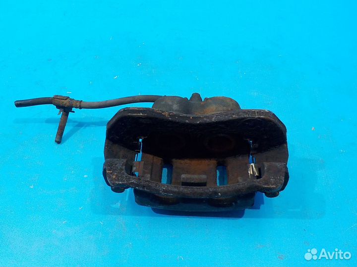 Тормозной суппорт передний левый KIA Sorento 1 200