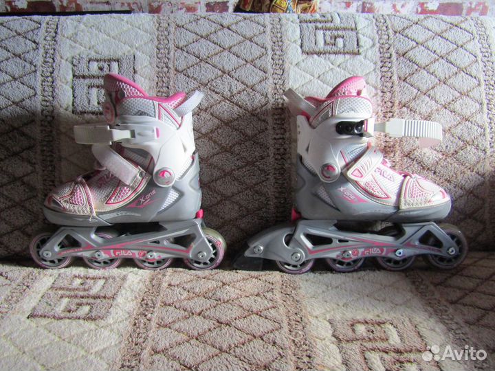 Роликовые коньки