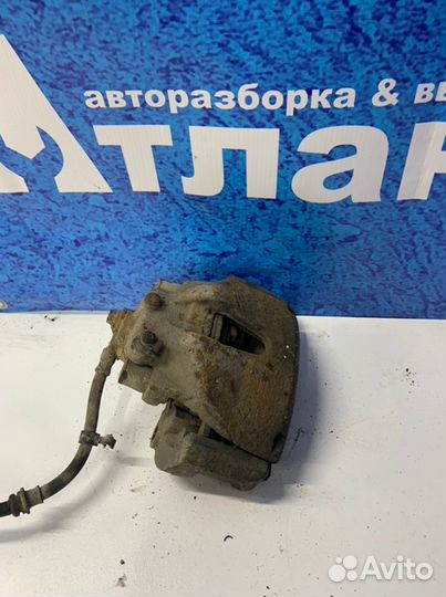 Суппорт тормозной передний правый Opel Astra H