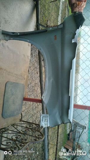 Левое крыло на ниссан х-трайл 2010