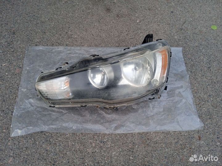 Фара mitsubishi lancer