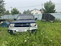 Mitsubishi Pajero iO 1.8 AT, 1998, 215 000 км, с пробегом, цена 345 000 руб.