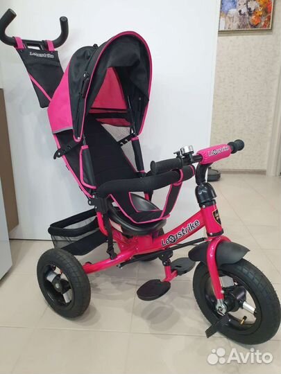 Трехколесный велосипед с ручкой