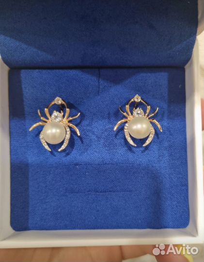 Продам золотые серьги