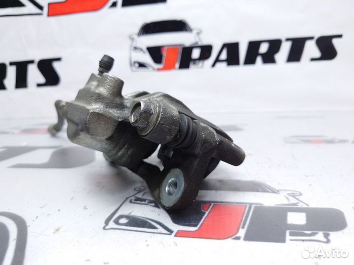 Суппорт задний правый Mitsubishi Lancer 10