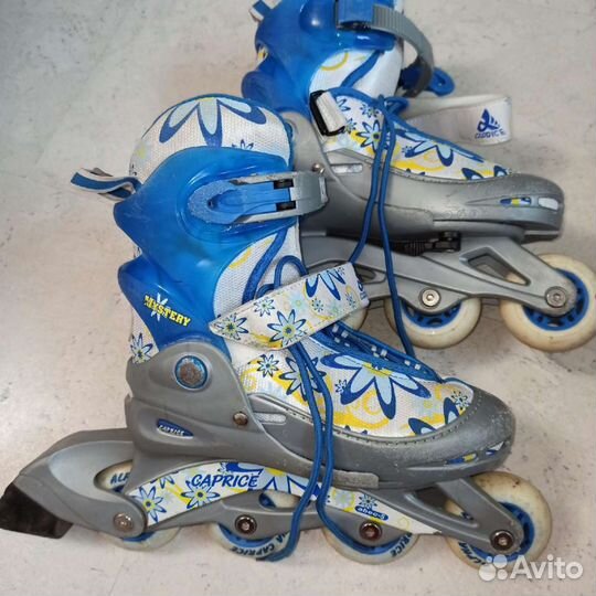 Роликовые коньки