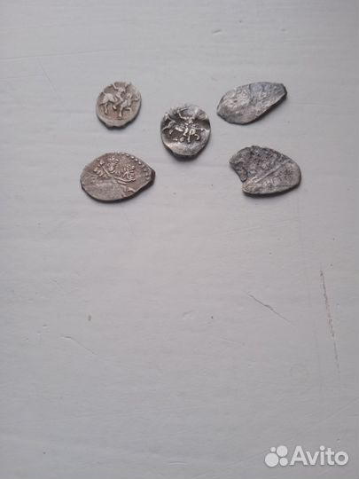 Монеты чешуя