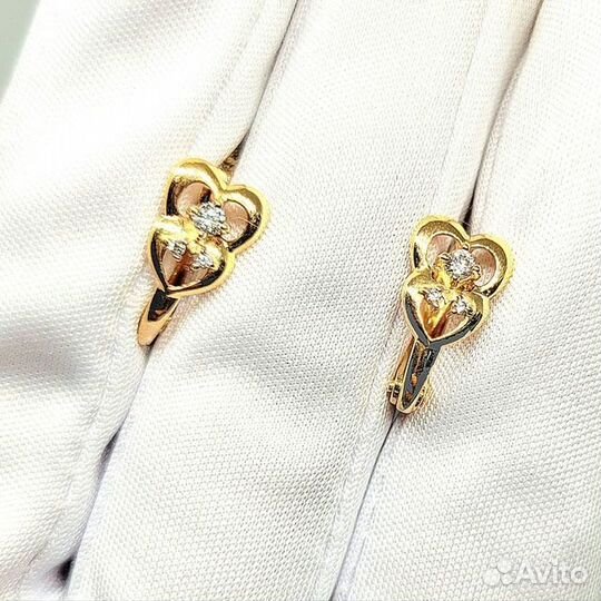 Золотые серьги с камнем