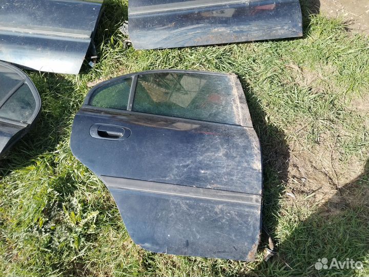 Двери мицубиси каризма