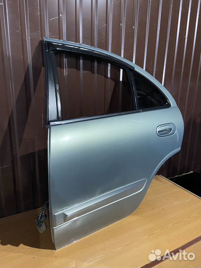 Задняя левая дверь на ниссан альмера классик