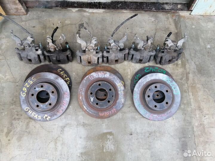 Суппорт левый Mazda 6 gg / gh