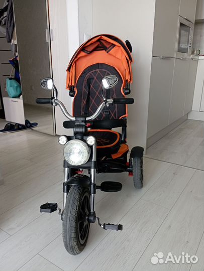 Трехколесный велосипед с родительской ручкой