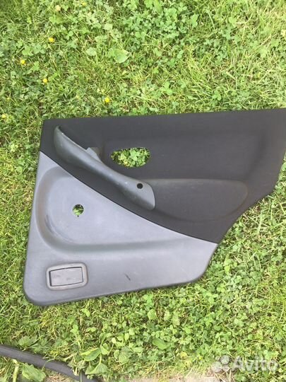 Обшивка задней двери Fiat Albea