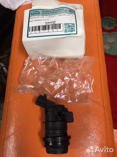 Моторчик омывателя лобового стекла на Мазду