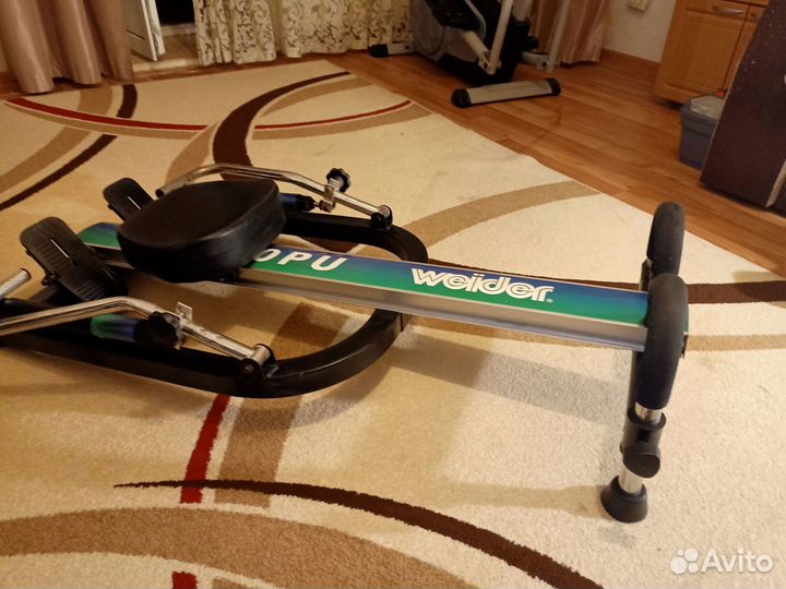 Гребной тренажер