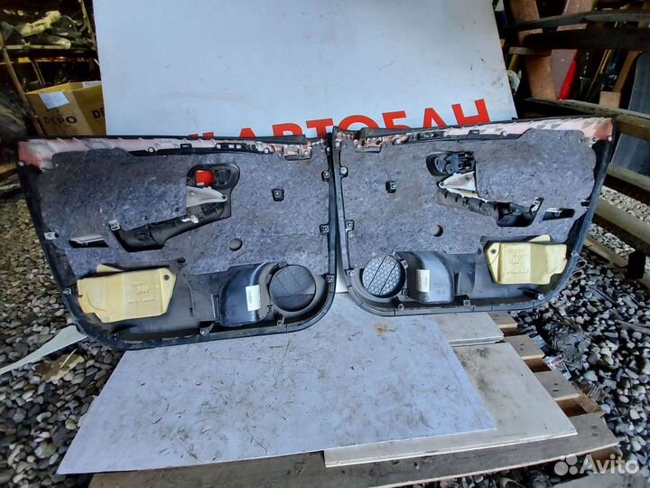 Обшивка двери передней левой правой Corolla E15 15