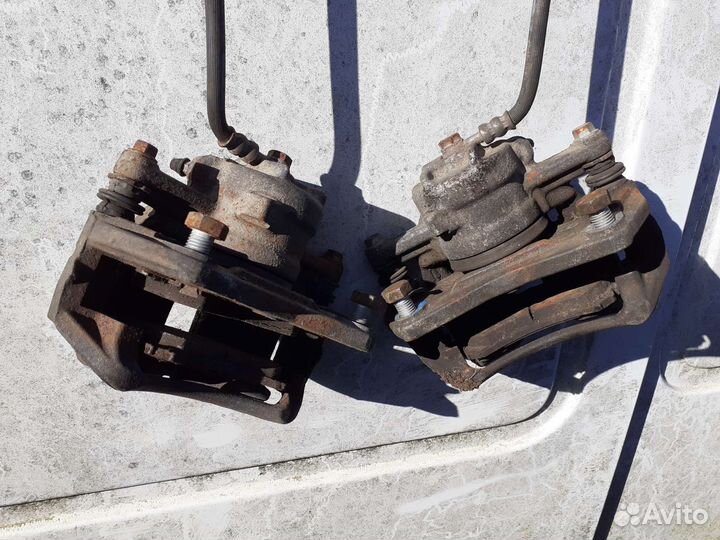 Суппорт тормозной передний Mitsubishi Colt (Z3)