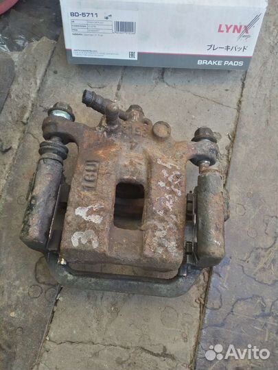 Суппорт задний левый x-trail t31