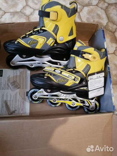 Роликовые коньки новые