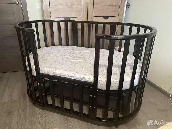 Детская кроватка трансформер с маятником