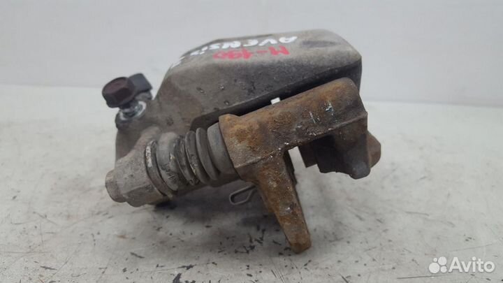 Тормозной суппорт задний левый Toyota Avensis 2