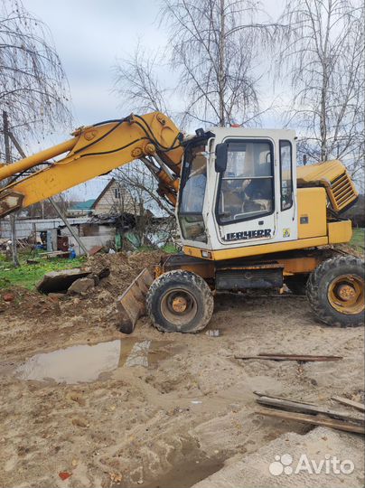 Услуги колёсного экскаватора
