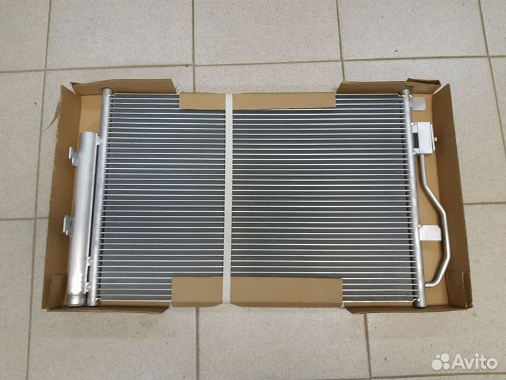 Радиатор кондиционера Chevrolet Aveo T 300