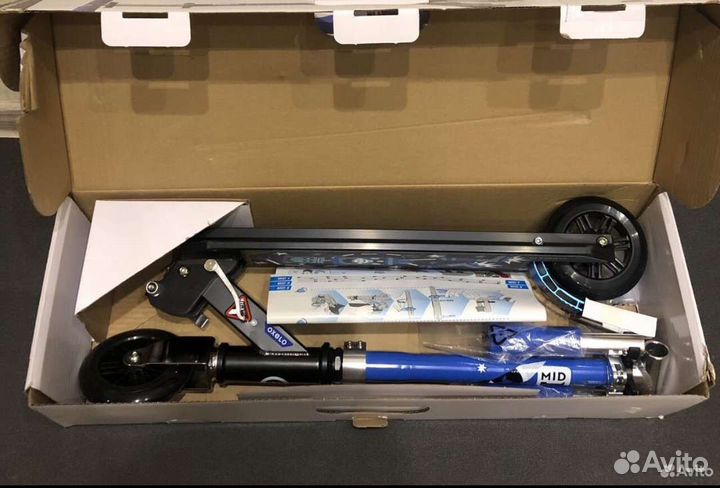 Новый Самокат oxelo MID 1