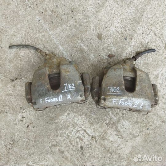 Суппорт левый/правый Ford Focus 2